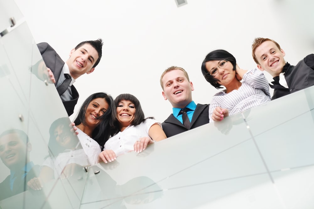 Group of business people standing in office
